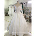 Une ligne de vente populaire personnalise une robe de mariée délicate